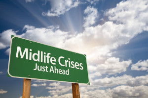 Midlife Crises Just Ahead Green Road Sign with Dramatic Clouds,